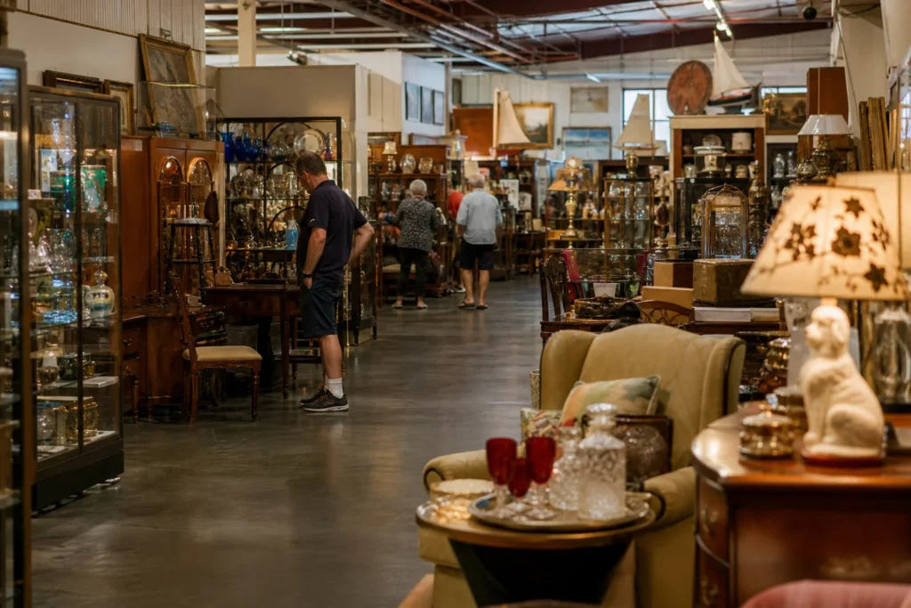shoppers browsing antique and vintage market stalls at Orange Circle Antique Mall in California, Los Angeles