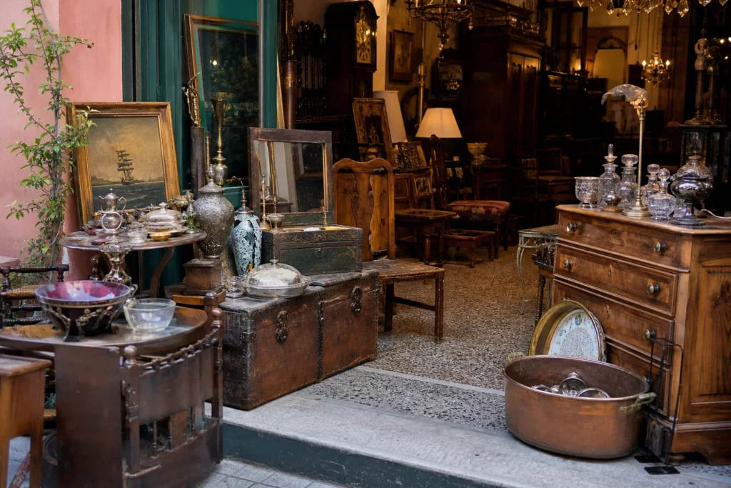 shoppers browsing antique and vintage market stalls at Paliosinitheies in Greece