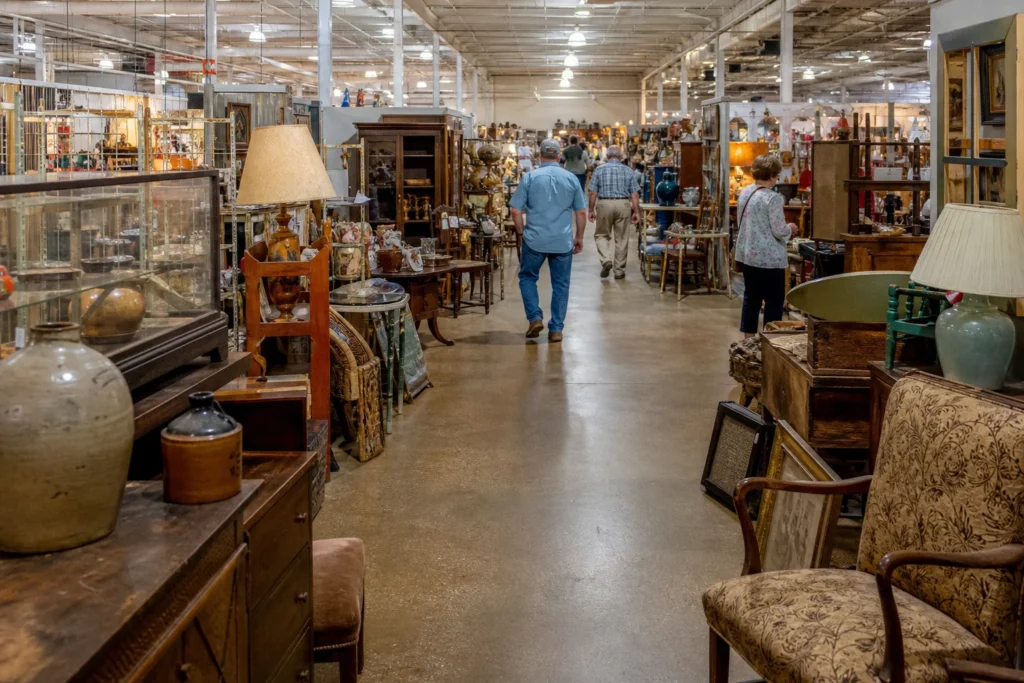 shoppers browsing antique and vintage market stalls at Prattville Pickers in Alabama