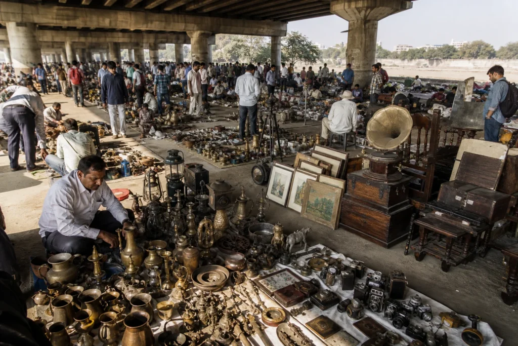 shoppers browsing antique and vintage market stalls at Ravivari Gujari Bazar in India