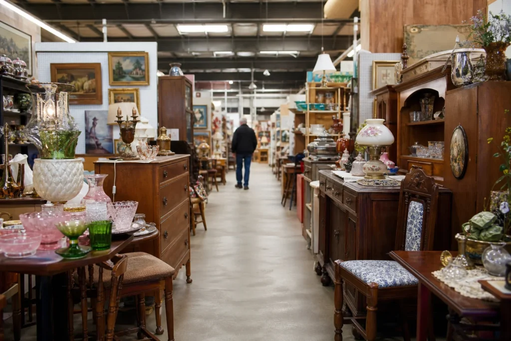 shoppers browsing antique and vintage market stalls at Relics Antique Mall in Missouri