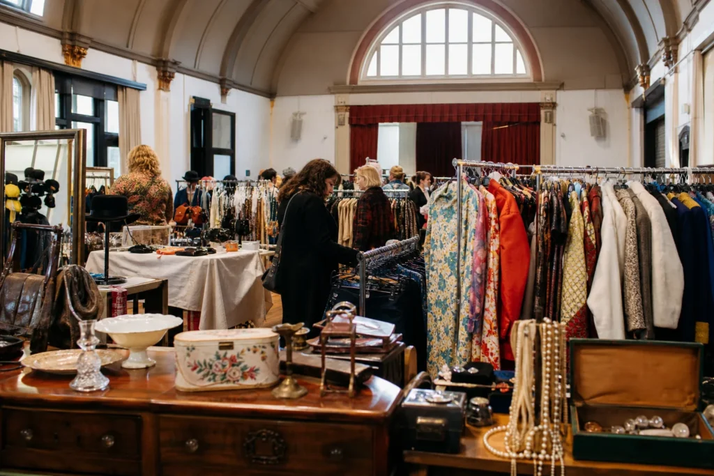 shoppers browsing antique and vintage market stalls at Round She Goes – Adelaide in South Australia