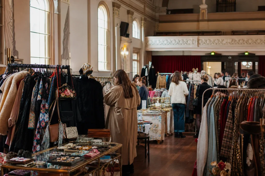 shoppers browsing antique and vintage market stalls at Round She Goes – Melbourne in Melbourne, Victoria