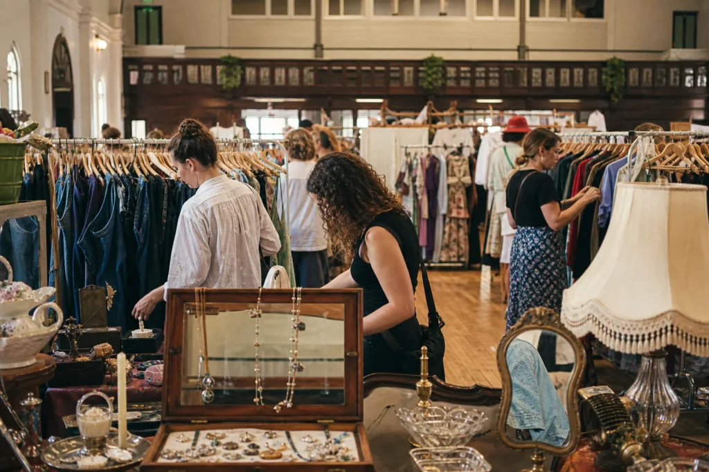 shoppers browsing antique and vintage market stalls at Round She Goes – Sydney in New South Wales, Sydney
