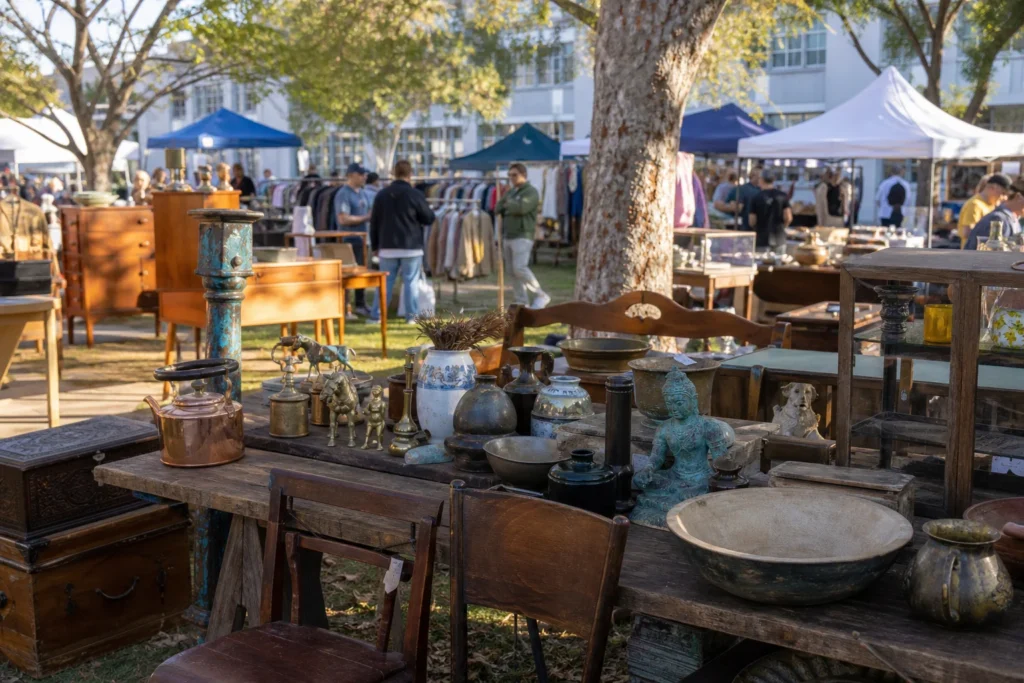 shoppers browsing antique and vintage market stalls at Rozelle Collectors Market in New South Wales, Sydney