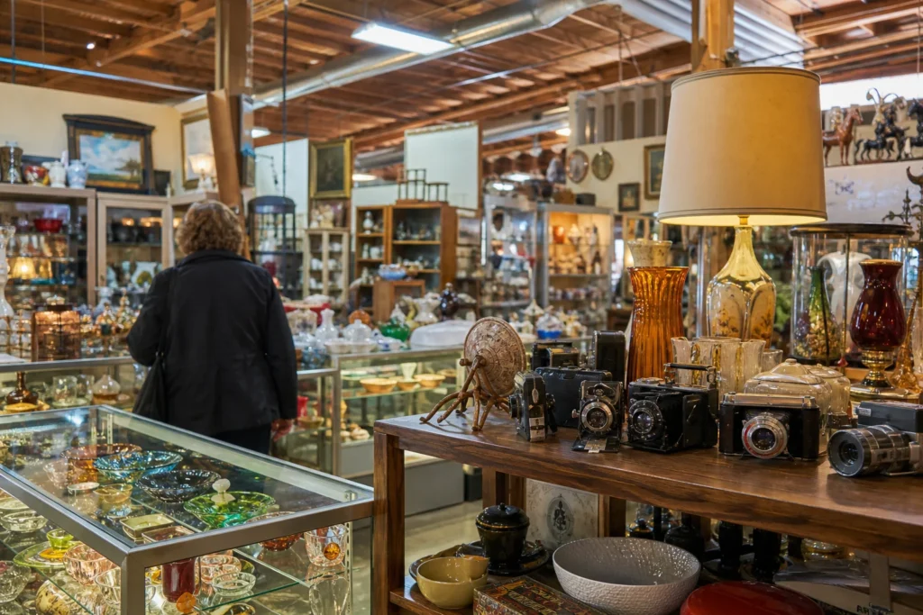 shoppers browsing antique and vintage market stalls at Sherman Oaks Antique Mall in California, Los Angeles