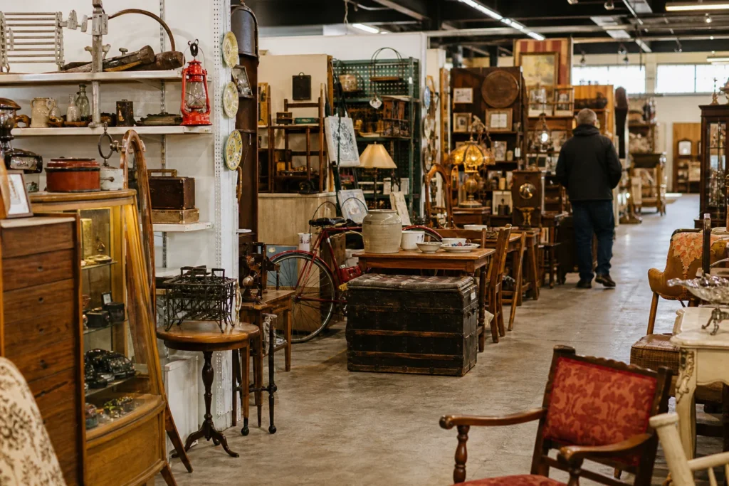 shoppers browsing antique and vintage market stalls at St. Jacobs Antiques Market in Canada, Ontario