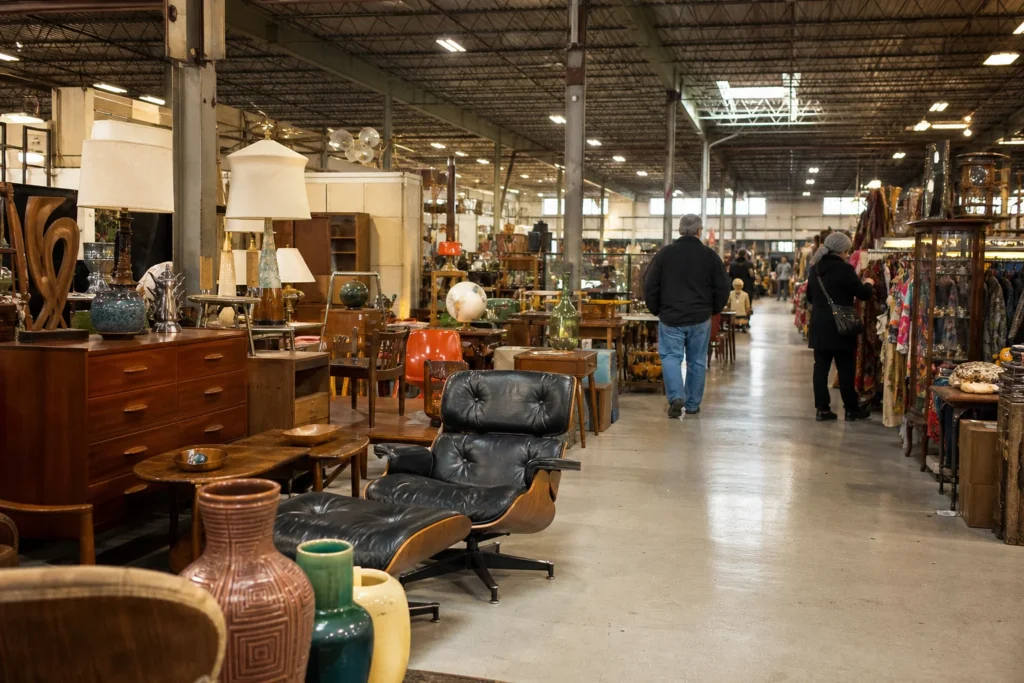 shoppers browsing antique and vintage market stalls at Stratford Antique Center in Connecticut