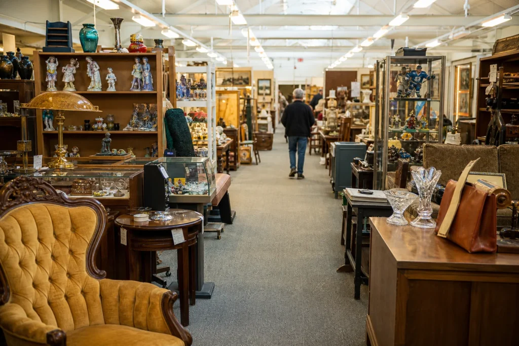 shoppers browsing antique and vintage market stalls at Stratford Antique Warehouse in Canada, Ontario