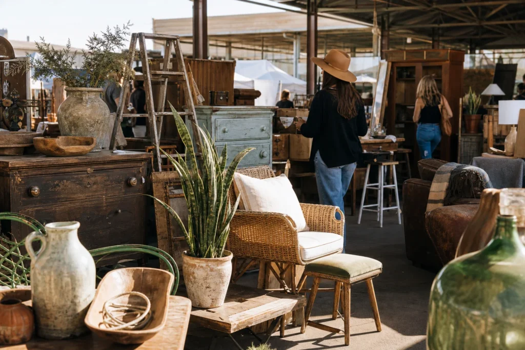 shoppers browsing antique and vintage market stalls at Sweet Salvage in Arizona