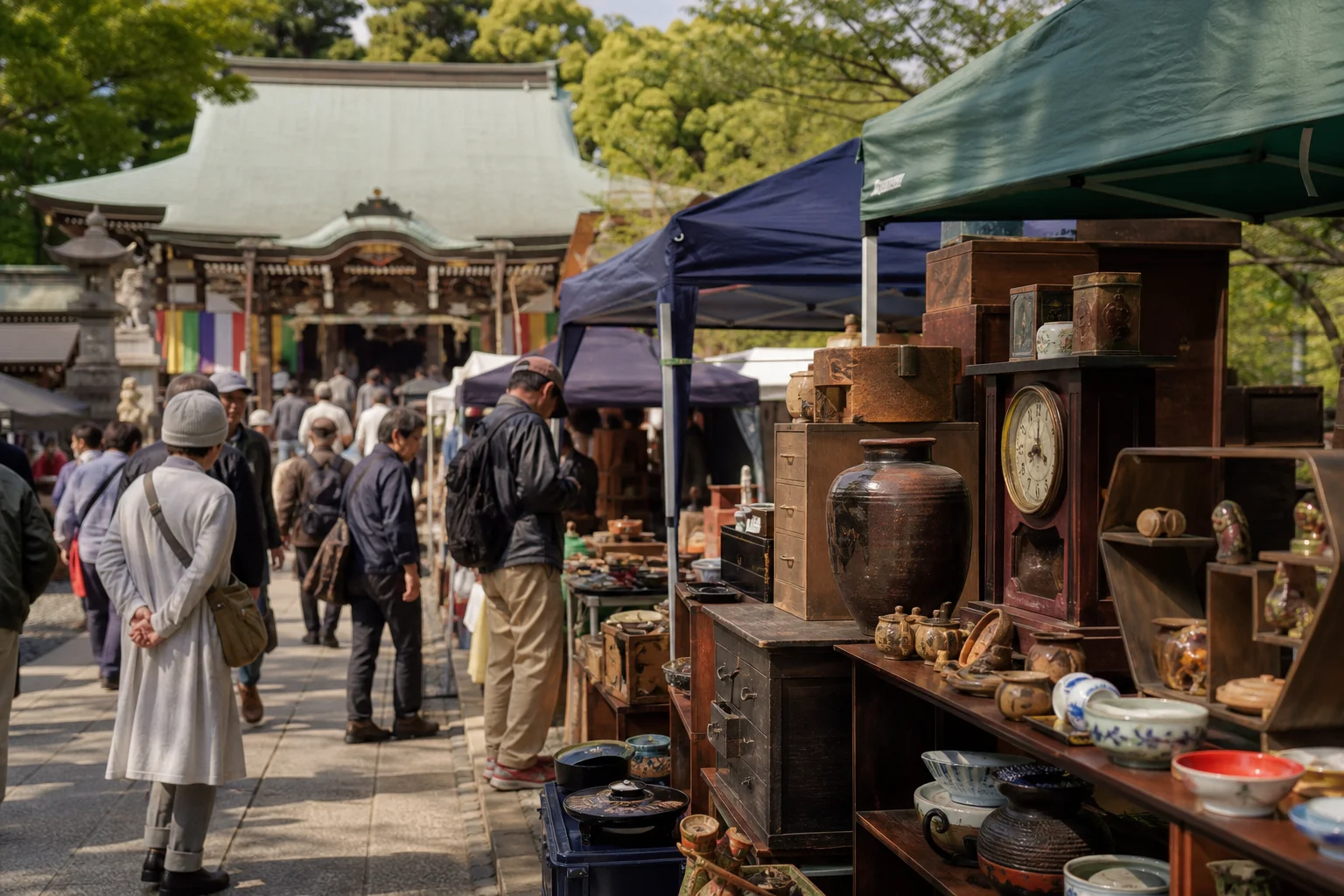 shoppers browsing antique and vintage market stalls at Takahata Fudoson Temple – 高幡不動ござれ市 in Japan, Tokyo