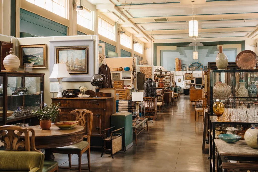 shoppers browsing antique and vintage market stalls at The Antique Society in California