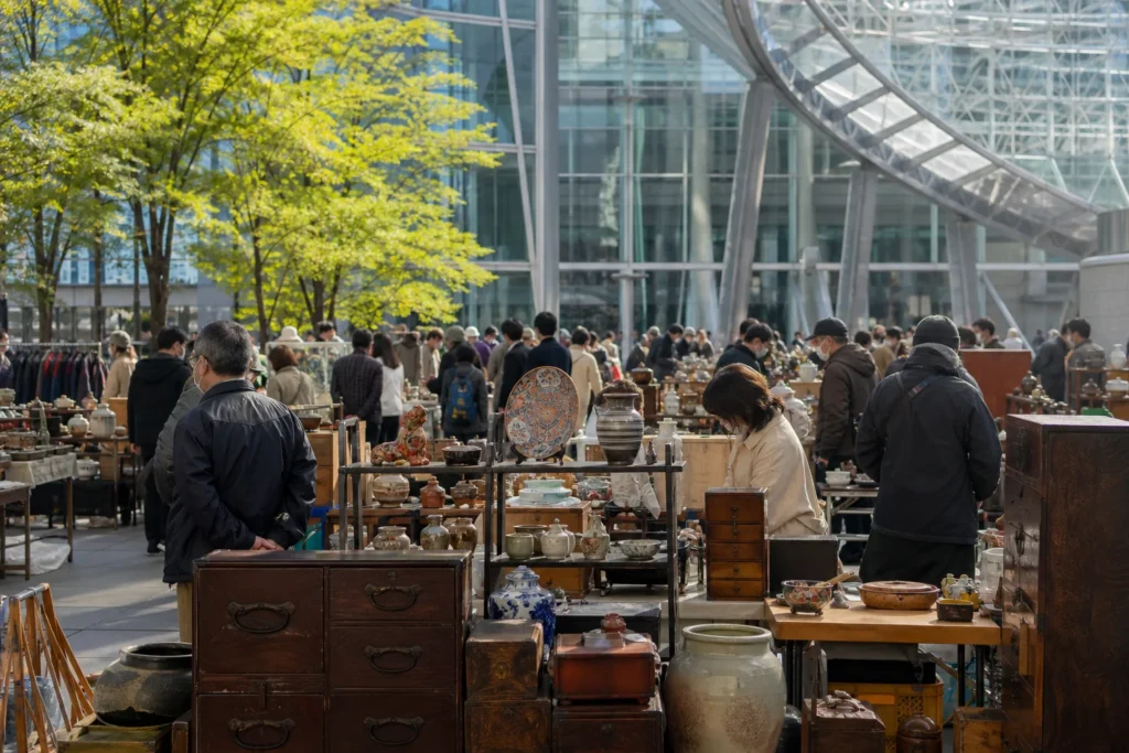 shoppers browsing antique and vintage market stalls at Tokyo International Forum – 東京国際フォーラム会場 in Japan, Tokyo