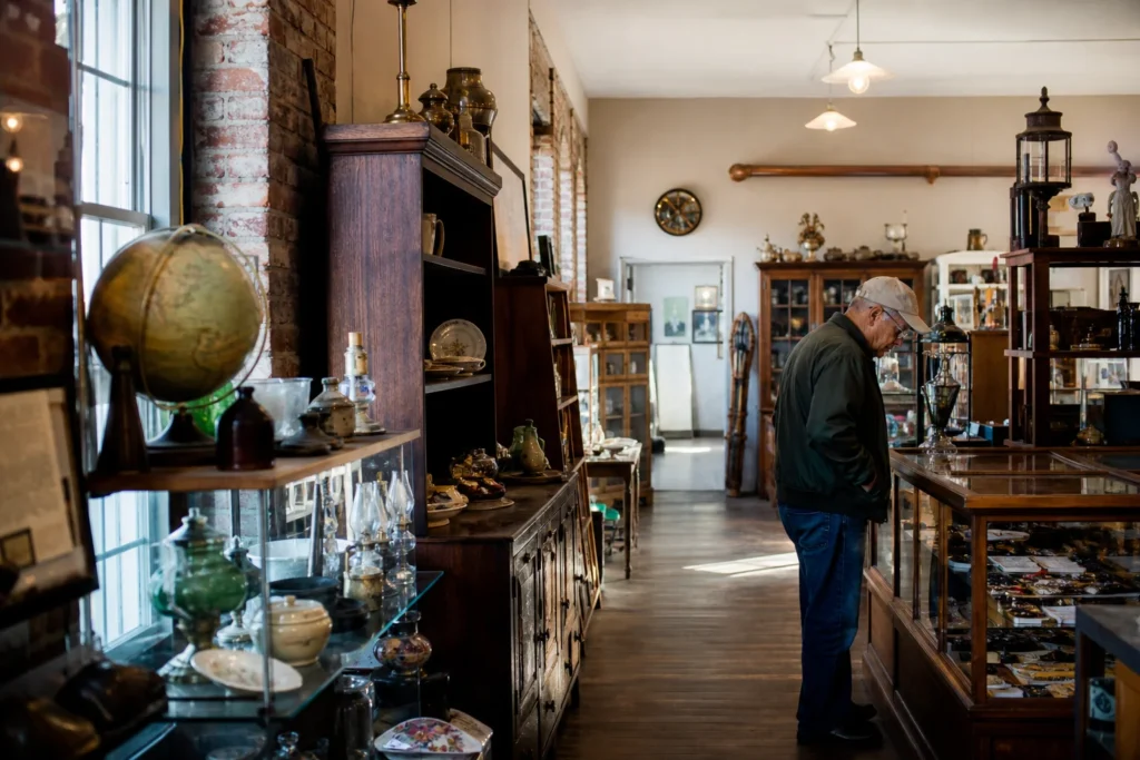 shoppers browsing antique and vintage market stalls at Trackside Mall and Antique Gallery in Idaho
