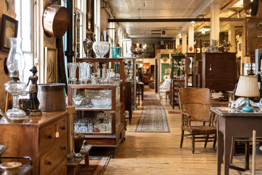 shoppers browsing antique and vintage market stalls at Union Street Antiques in New Hampshire