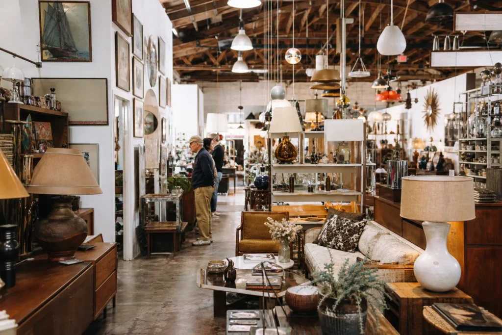 shoppers browsing antique and vintage market stalls at Urban Americana in California, Los Angeles