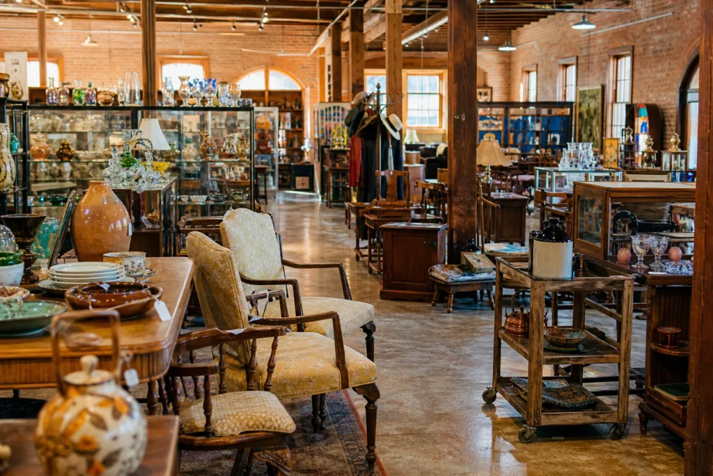 shoppers browsing antique and vintage market stalls at Whistlestop Antiques in California