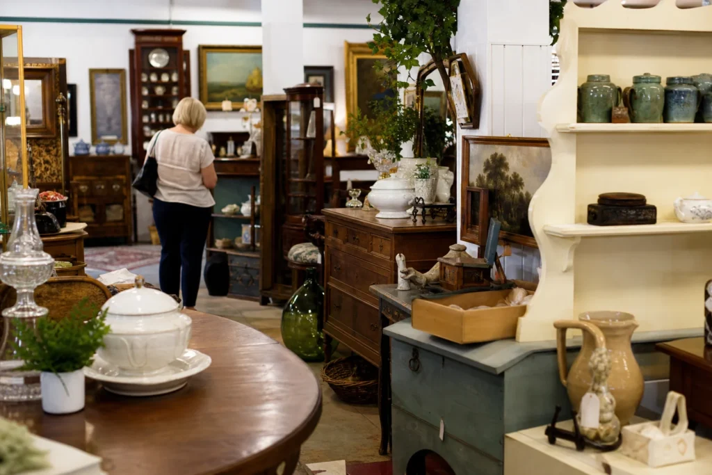 shoppers browsing antique and vintage market stalls at Cobb Antique Mall in Georgia