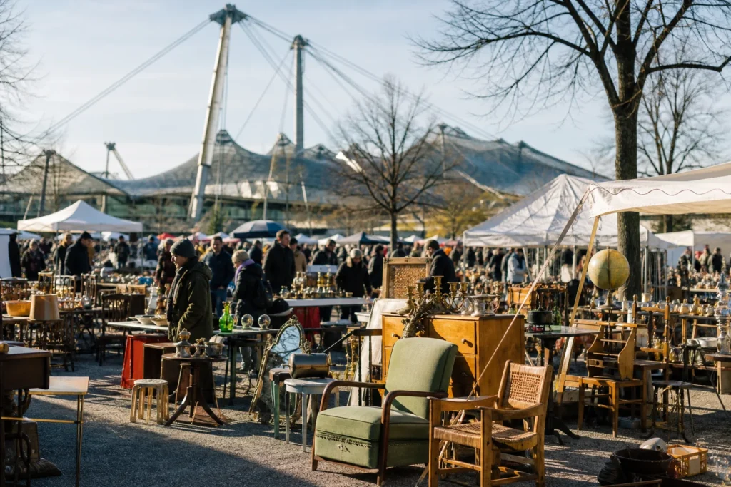 shoppers browsing antique and vintage market stalls at Kavalleriemarkt in Germany