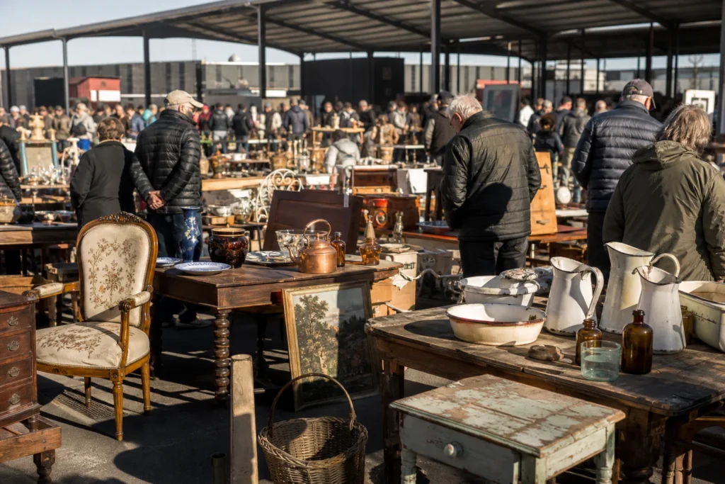 shoppers browsing antique and vintage market stalls at Laverton Rubble and Riches market in Melbourne, Victoria